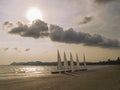 White Sail boat on tropical beach Royalty Free Stock Photo