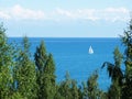 White sail on issyk-kul lake Royalty Free Stock Photo
