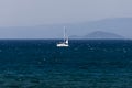 White sailboat on the blue aegean turkish sea Royalty Free Stock Photo