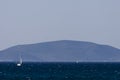 White sailboat on the blue aegean turkish sea Royalty Free Stock Photo