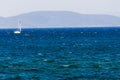 White sailboat on the blue aegean turkish sea Royalty Free Stock Photo