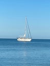 White sailboat ocean blue water