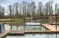 White sailboat moored in a river, Oregon.