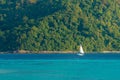 sailboat sailing on two color-tones seawater