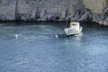 White sailing boat in the sea gulf with turquoise water at azure coast of the Mediterranean Sea Royalty Free Stock Photo