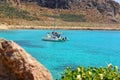 White sailing catamaran is anchored in the azure Harbor in the windless, without people Royalty Free Stock Photo