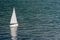 White Sailing Yacht Model Floating In The Lake