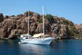 White sailing yacht moored in Aegean sea near Turkey coast. Luxury white boat yacht. Ships in sea. Sea traveling. View Royalty Free Stock Photo