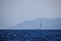 The white sails of yachts on the background of sea and mountains Royalty Free Stock Photo