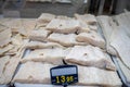 White salted and dried bacalao codfish, traditional Spanish food on display in fish shop Royalty Free Stock Photo