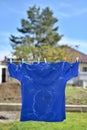 White salty sweat stains on blue clothes Royalty Free Stock Photo