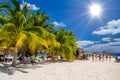 White sand beach with cocos palms, Isla Mujeres island, Caribbean Sea, Cancun, Yucatan, Mexico Royalty Free Stock Photo