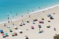 White sandÃÂ beach with colorful parasols Royalty Free Stock Photo