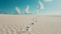 White sand beach with footprints and wide sky. Royalty Free Stock Photo