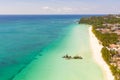 White sand beach and lagoon with turquoise water, aerial view. Boracay island Grotto, Willy`s Rock. Royalty Free Stock Photo