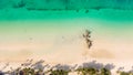 White sand beach and lagoon with turquoise water, aerial view. Boracay island Grotto, Willy`s Rock. Royalty Free Stock Photo