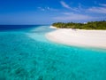 White sand beach on tropical island with turquoise sea water and blue sky, perfect holidays vacation destination. Luxury travel, Royalty Free Stock Photo