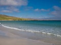 The white sand and blue sea at Sandwick on the island of Unst in Shetland, Scotland, UK