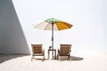 White sand, chairs and a beach umbrella on a white background. Generative AI Royalty Free Stock Photo