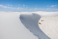 White sand dunes and blue cloudy sky in New Mexico desert Royalty Free Stock Photo