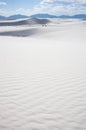 White sand dunes and blue cloudy sky in New Mexico desert Royalty Free Stock Photo