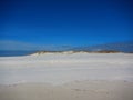 White sand dunes with blue sky Royalty Free Stock Photo