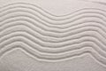 White sand with pattern as background, closeup. Concept of zen and harmony Royalty Free Stock Photo