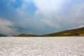 White sand and shingle beach line