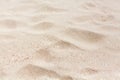 White sand texture background, wavy sandy pattern, sand grains backdrop, sand surface top view, desert dune, tropical sea beach Royalty Free Stock Photo