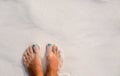 White sand texture woman feet. Relaxed tourist on beach. Tropical vacation banner template with text place Royalty Free Stock Photo