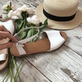 White sandals on a wooden background Royalty Free Stock Photo