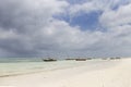 White sands beach with fishing boats,Zanzibar island,Tanzania Royalty Free Stock Photo