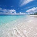 White sandy beach, clear water, and a pristine sky