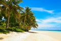 White sandy Manase beach paradise, tropical palm trees and turquoise ocean lagoon, Savai`i Island Royalty Free Stock Photo