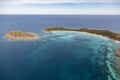 White sandy Sardinian beach with emerald waters. Aerial view