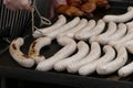 White sausages on a grill Royalty Free Stock Photo