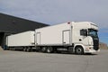 White Scania R560 Full Trailer Unloading at a Warehouse