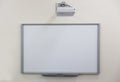 white school board and projection Royalty Free Stock Photo