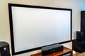 white screen on the wall for the projector Royalty Free Stock Photo