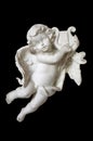 White sculpture of cupid