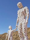 White sculpture, father and son from same material Royalty Free Stock Photo