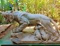 A white sculpture of a lioness feeding her cubs in Sukha Vana, Mysore Royalty Free Stock Photo