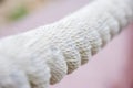 White sea rope close-up on a wharf in the summer Royalty Free Stock Photo