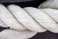 White sea rope close-up on a wharf in the summer Royalty Free Stock Photo