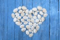 White sea shells forming a heart Royalty Free Stock Photo