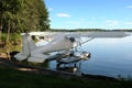 White seaplane on the lake shore