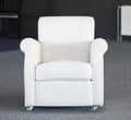 White second-hand chair in furniture warehouse