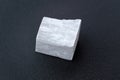 White selenite, variety of the mineral gypsum, zen meditation stones, black background