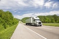 White Semi Truck On Highway In Springtime Royalty Free Stock Photo