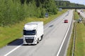 White Semi Truck Refrigerated Trailer on Motorway